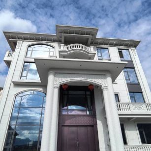 肇庆白麻别墅外墙干挂石材效果示例