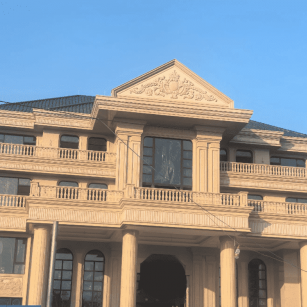 肇庆黄金麻别墅外墙干挂石材效果示例