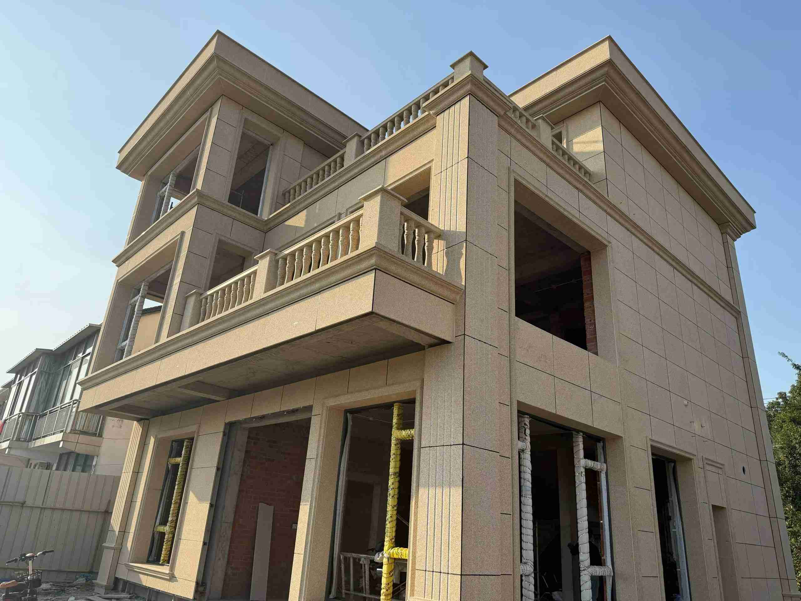 肇庆 黄金麻花岗岩石材荔枝面外墙干挂效果展示